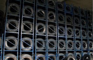 tyres stacked and stored in a foldable steel stillage