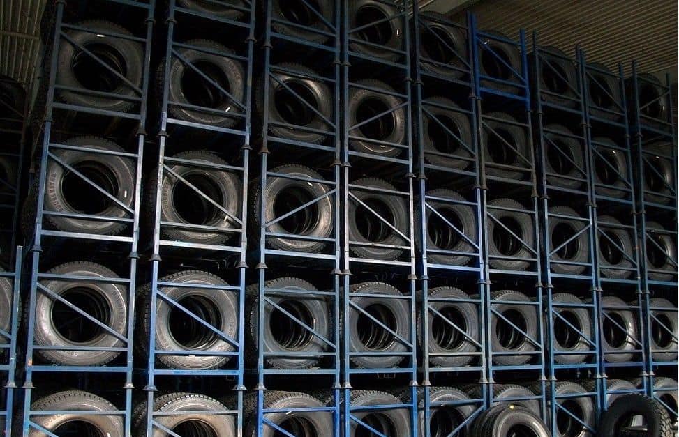 tyres stacked and stored in a foldable steel stillage